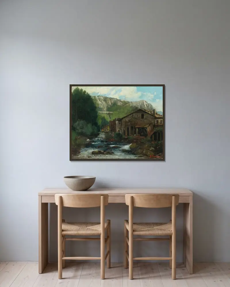 En kvarn i ett klipplandskap av Gustave Courbet inramad på en vägg