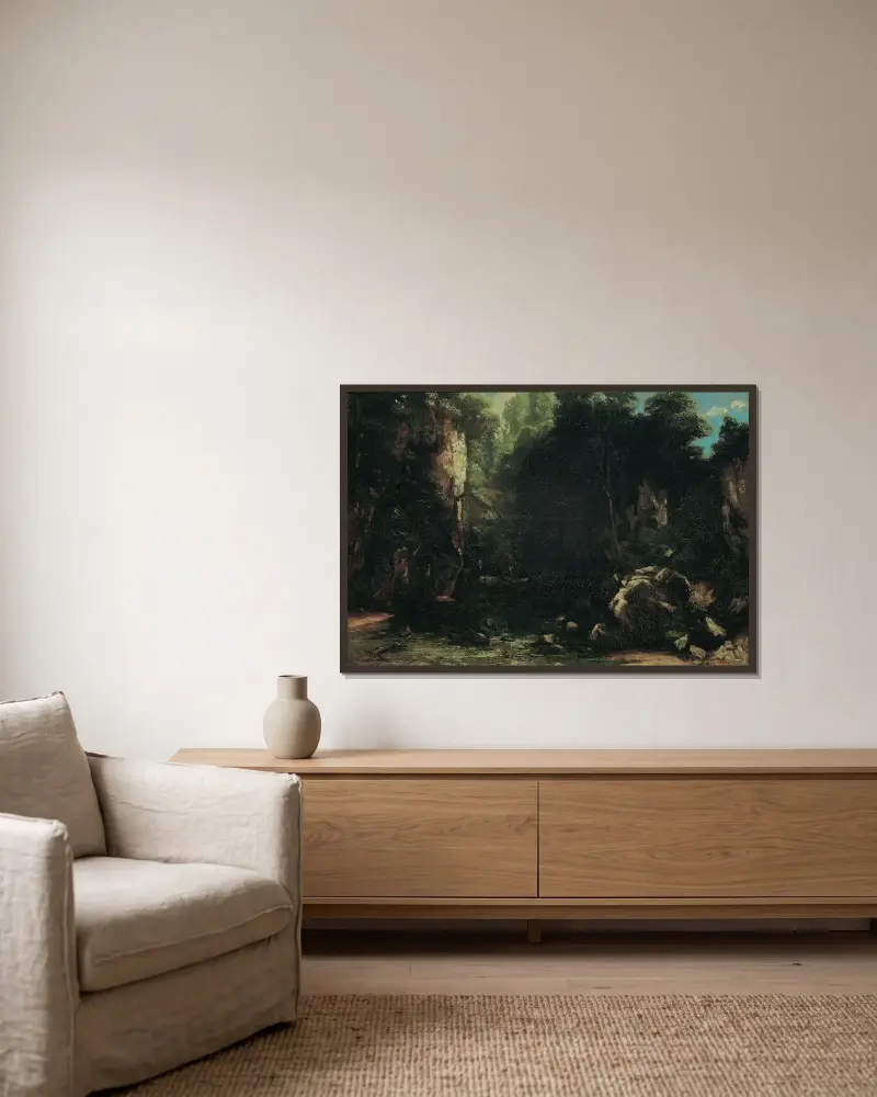 Der Schattige Bach av Gustave Courbet inramad på en vägg