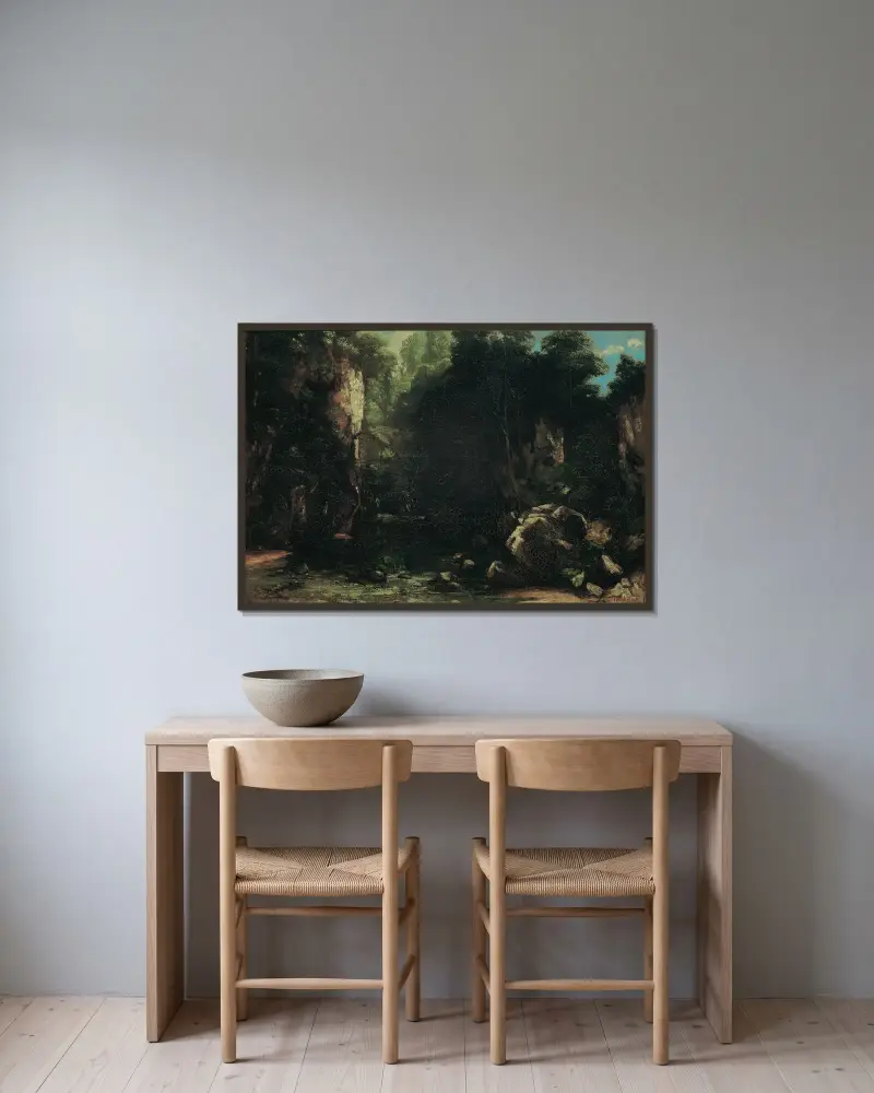 Der Schattige Bach av Gustave Courbet inramad på en vägg