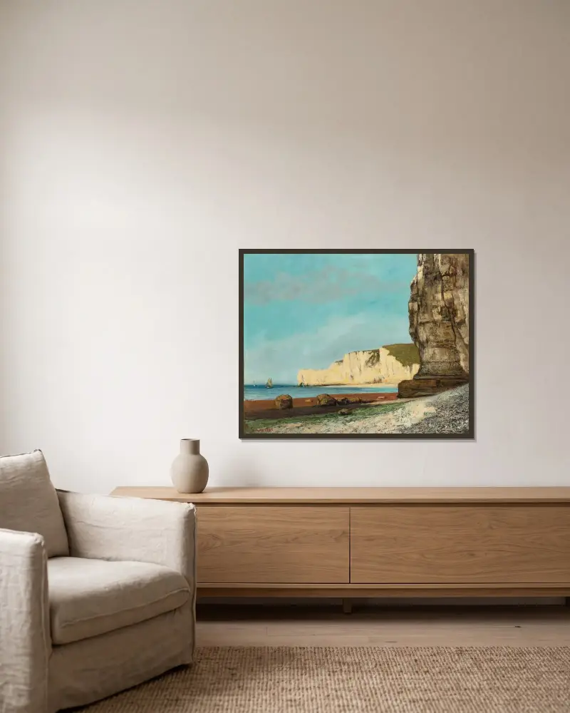 Étretat; Les Falaises av Gustave Courbet inramad på en vägg