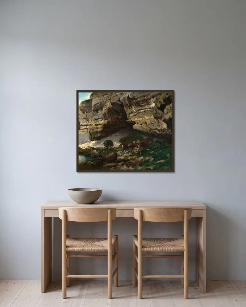 Kuperat landskap med rådjur av Gustave Courbet inramad på en vägg