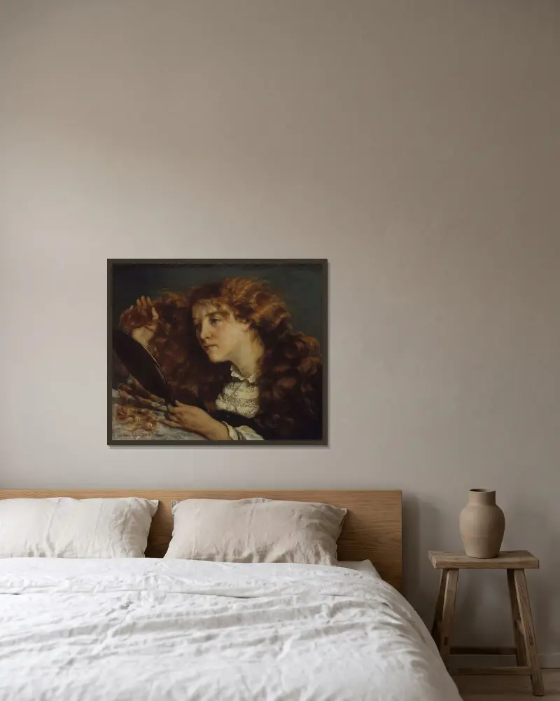 Jo, La Belle Irlandaise av Gustave Courbet inramad på en vägg