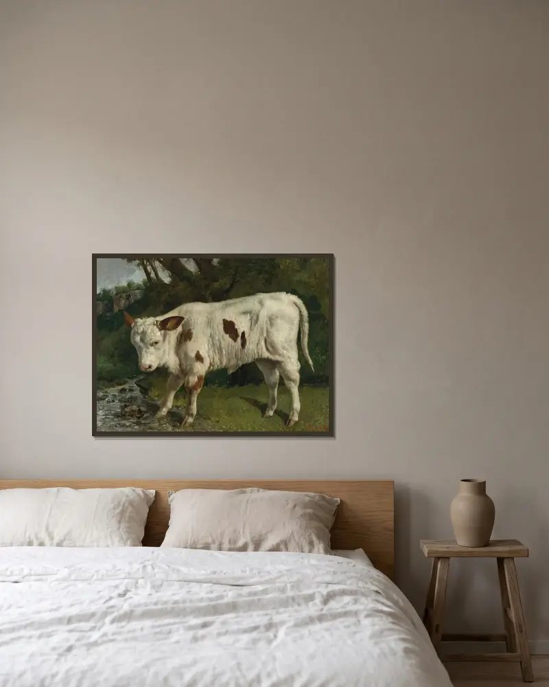 Le Veau Blanc av Gustave Courbet inramad på en vägg