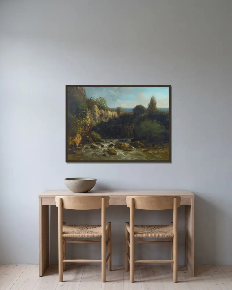 Les Gorges De La Loue av Gustave Courbet inramad på en vägg