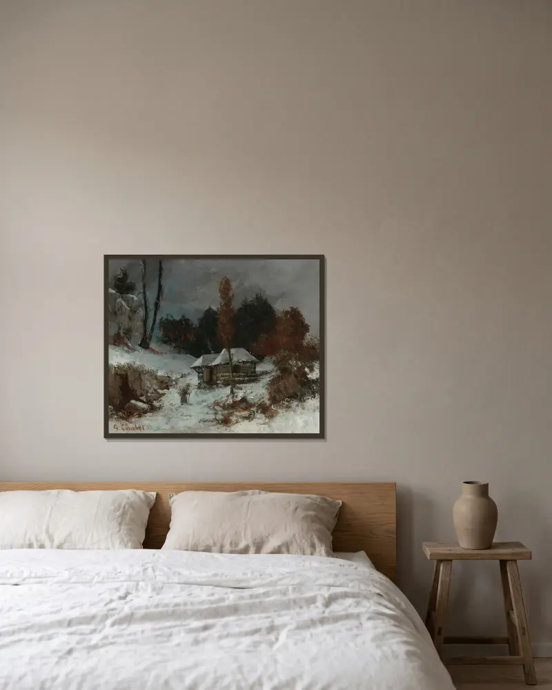 Kvinna med knippe i snölandskap av Gustave Courbet inramad på en vägg