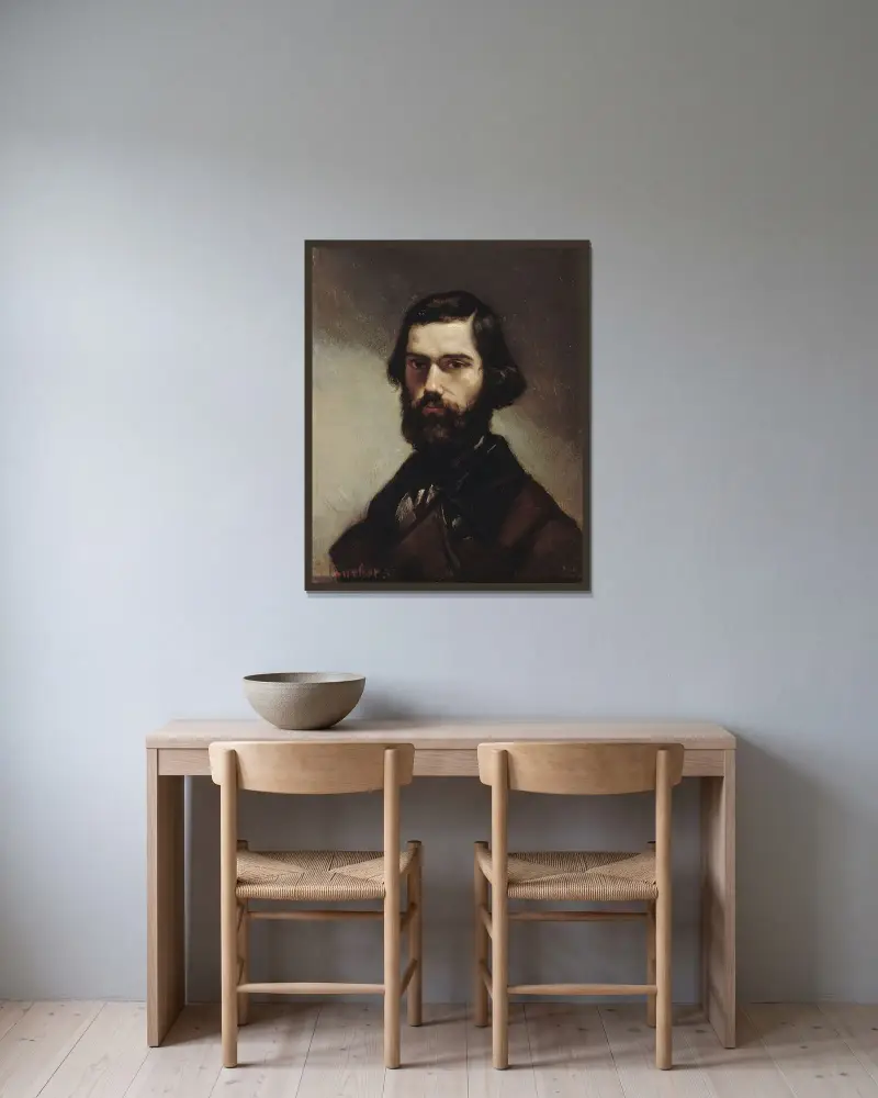 Portrait de Jules Vallès av Gustave Courbet inramad på en vägg
