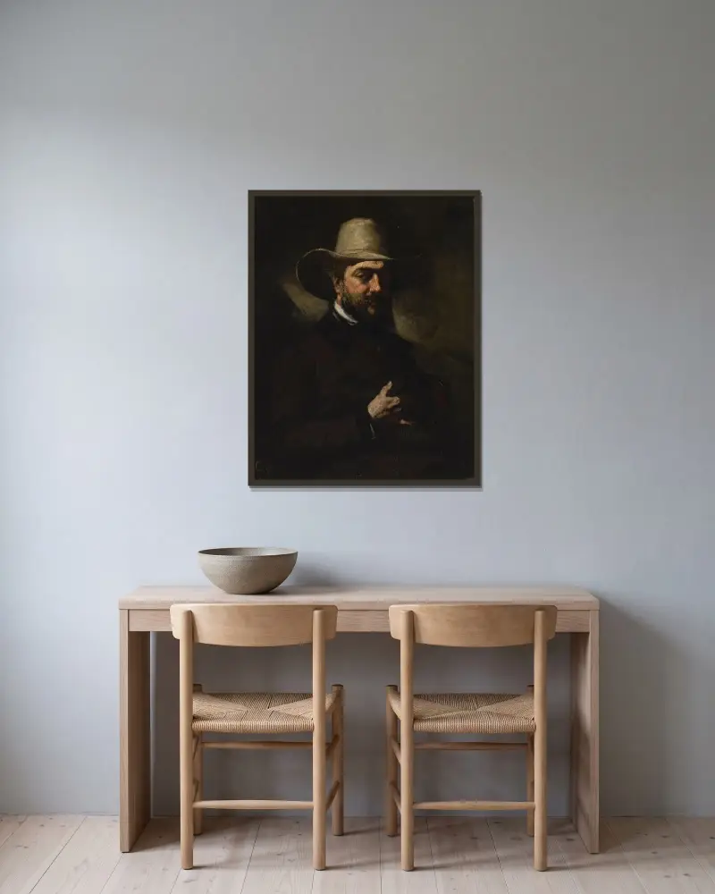 Portrait d’Urbain Cuenot av Gustave Courbet inramad på en vägg