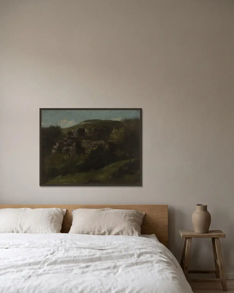 Rochers À Ornans av Gustave Courbet inramad på en vägg