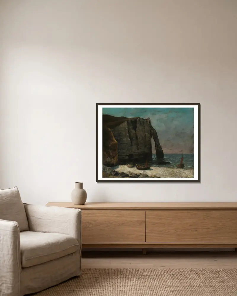 The Cliff at Étretat av Gustave Courbet inramad på en vägg