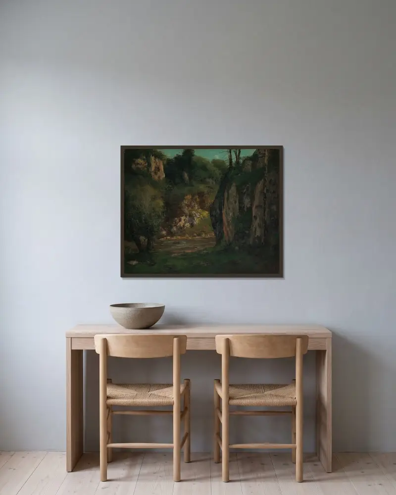 Der verborgene Bach von Gustave Courbet gerahmt an einer Wand