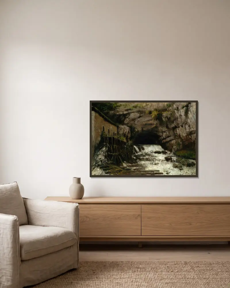 The Source of the Loue av Gustave Courbet inramad på en vägg