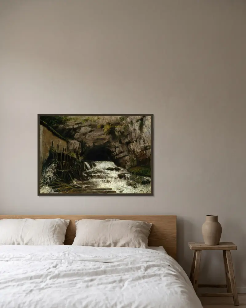 The Source of the Loue av Gustave Courbet inramad på en vägg