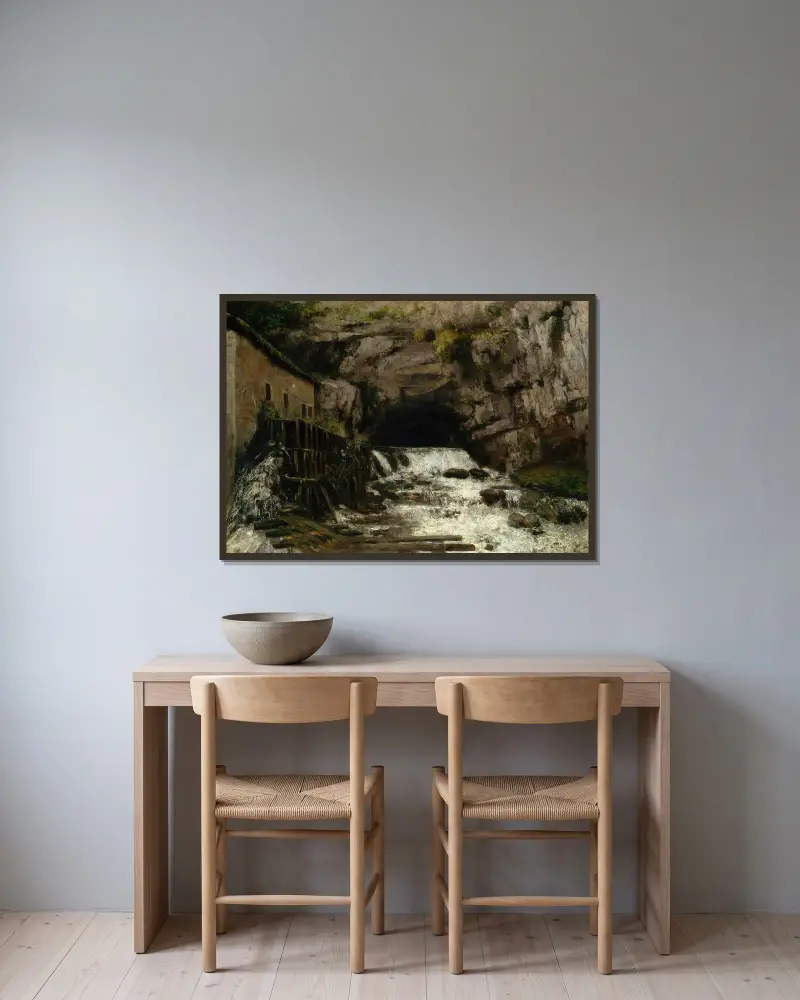 The Source of the Loue av Gustave Courbet inramad på en vägg