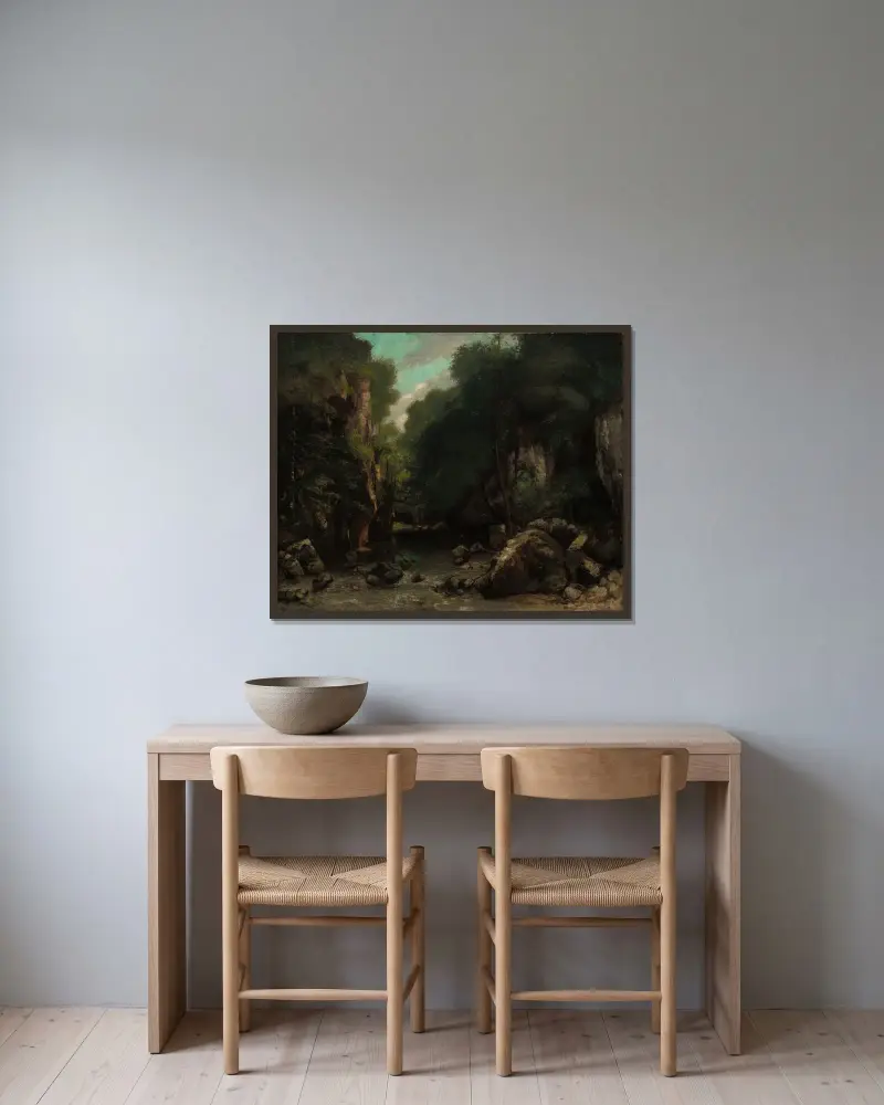Dalen vid Les Puits-Noir av Gustave Courbet inramad på en vägg