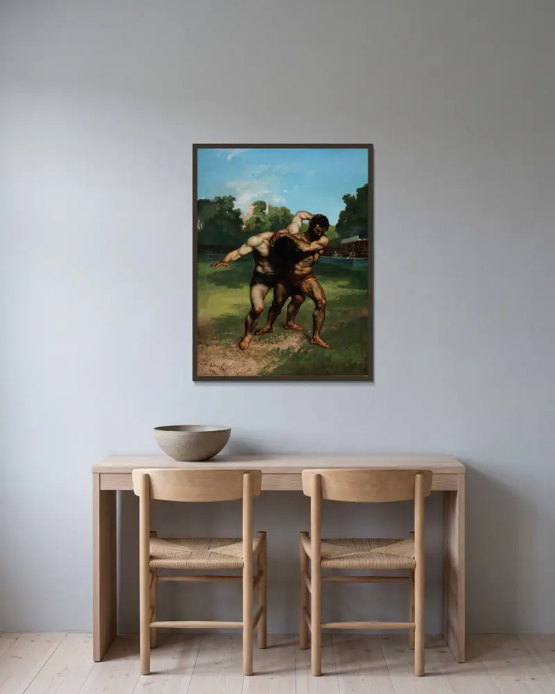 The Wrestlers av Gustave Courbet inramad på en vägg
