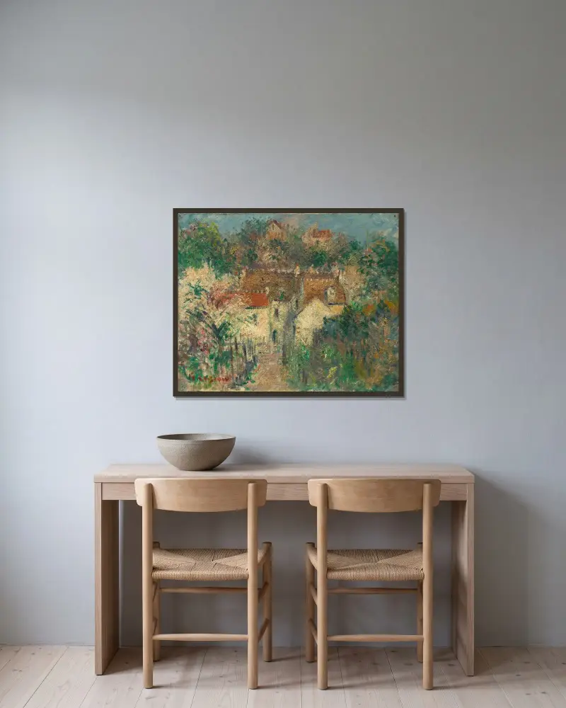 Vy av by av Gustave Loiseau inramad på en vägg