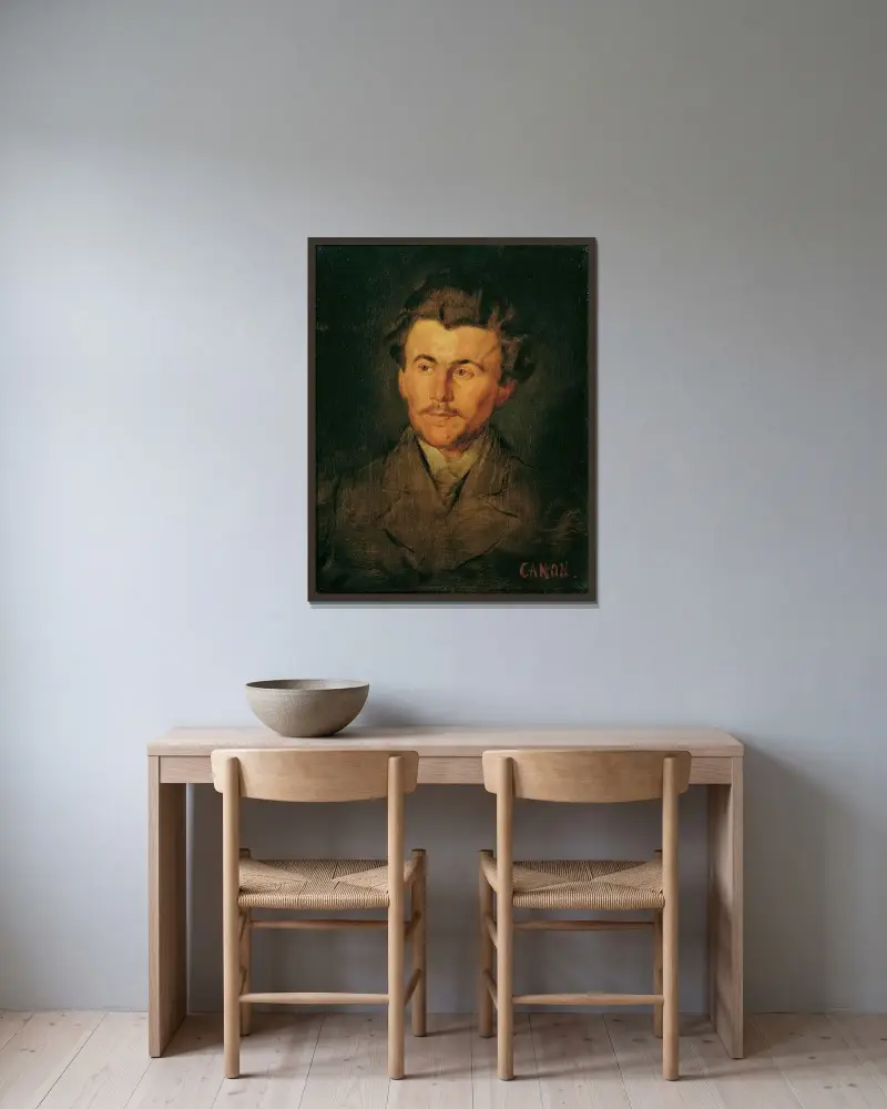 Manligt studiehuvud av Hans Canon inramad på en vägg