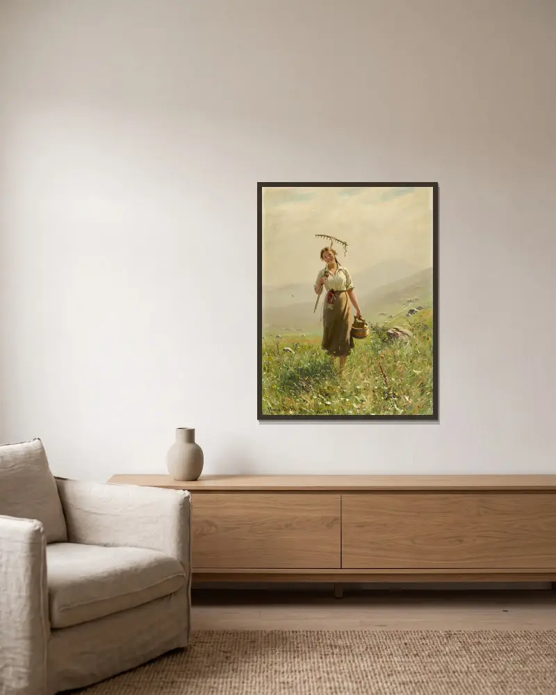 A Young Woman In The Meadow av Hans Dahl inramad på en vägg
