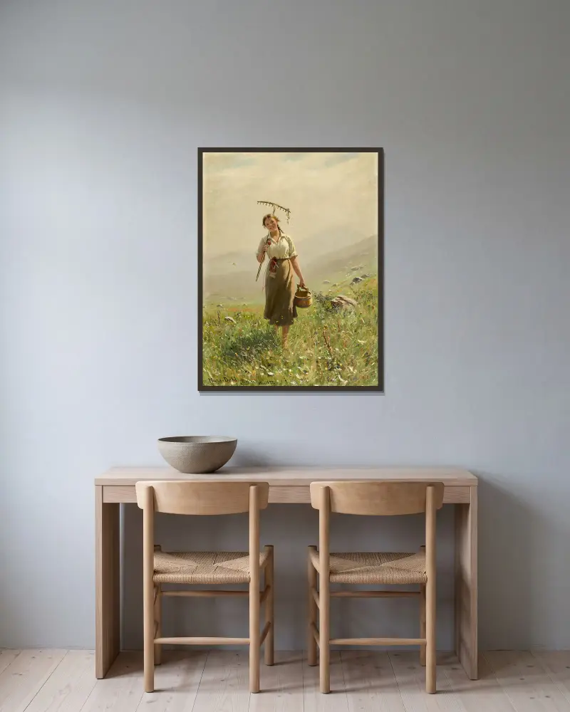 A Young Woman In The Meadow av Hans Dahl inramad på en vägg