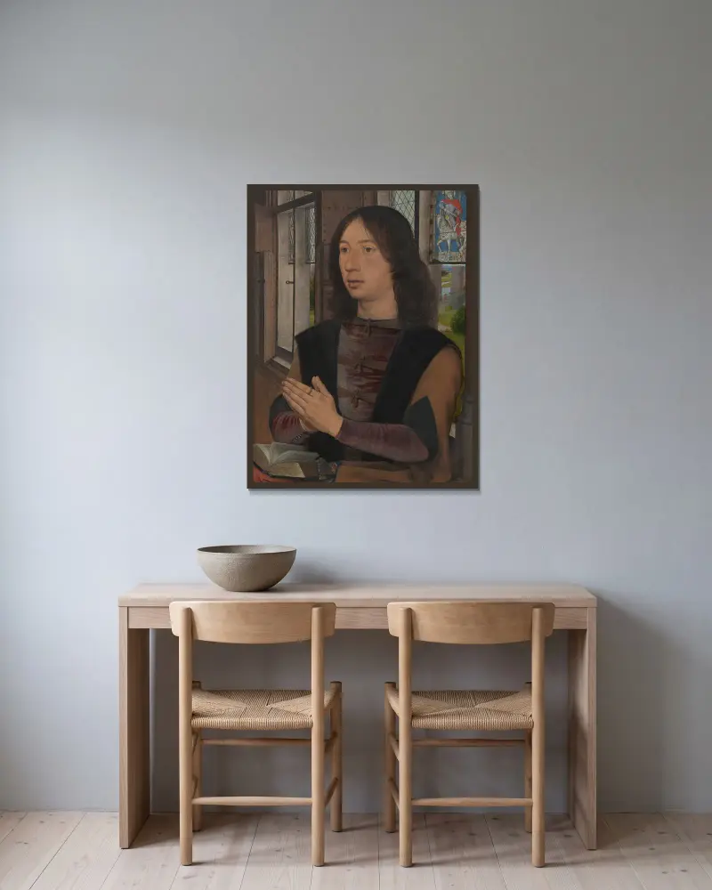 Maarten van Nieuwenhove av Hans Memling inramad på en vägg