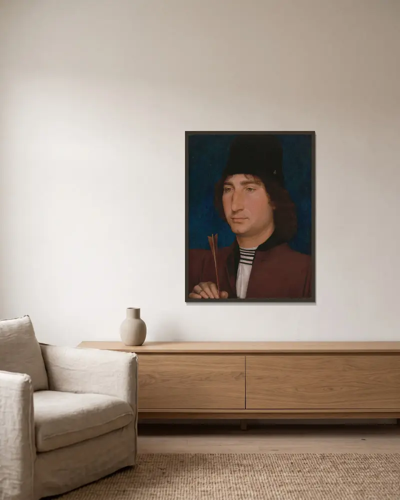 Portrait of a Man with an Arrow av Hans Memling inramad på en vägg