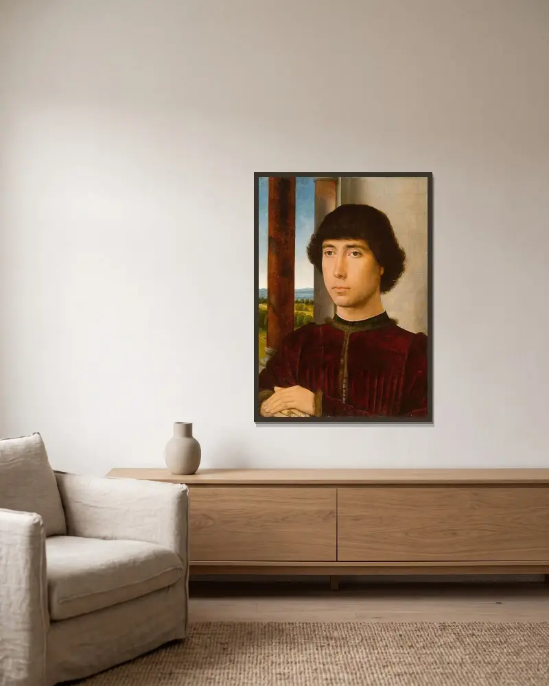Porträtt av en ung man av Hans Memling inramad på en vägg