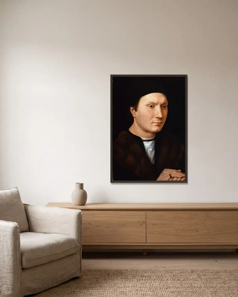Porträtt av en okänd man av Hans Memling inramad på en vägg