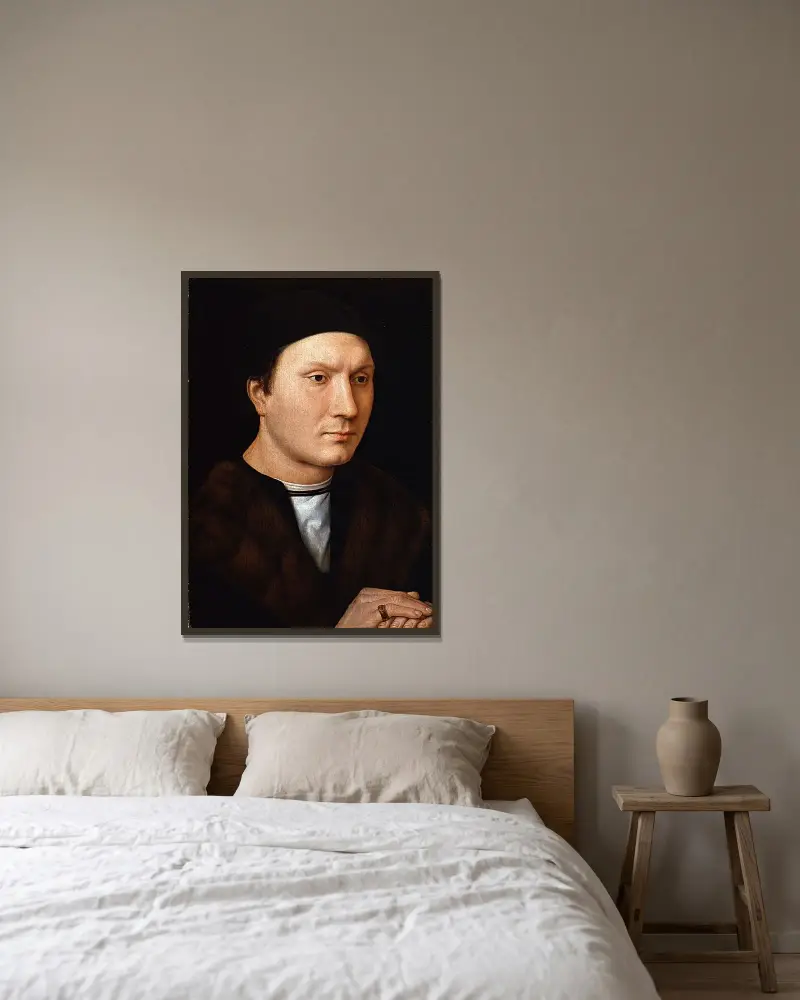 Porträtt av en okänd man av Hans Memling inramad på en vägg