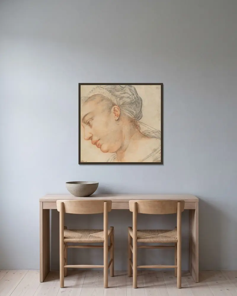 Ung kvinnas huvud av Hendrick Goltzius inramad på en vägg