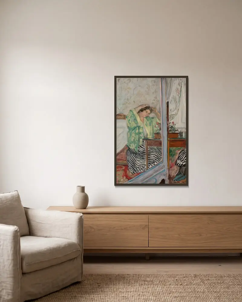 Kvinna vid sin toalett av Henri Lebasque inramad på en vägg