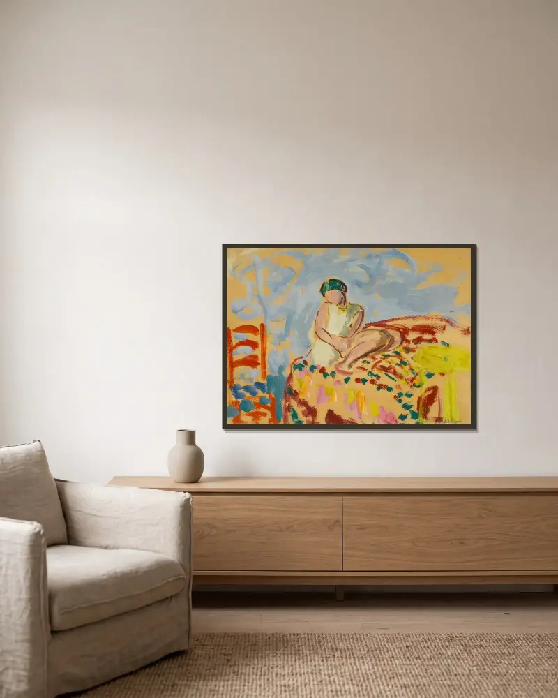 Ung flicka med grön turban sittande på en soffa av Henri Lebasque inramad på en vägg