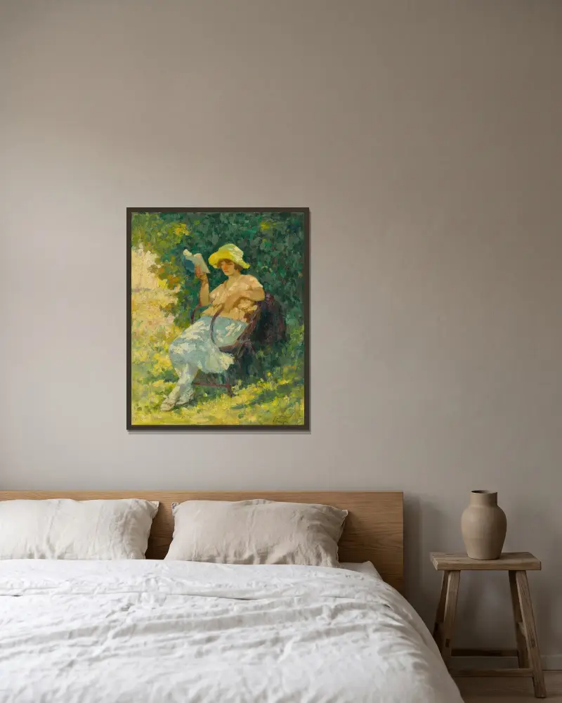 Läsning i trädgården av Henri Lebasque inramad på en vägg