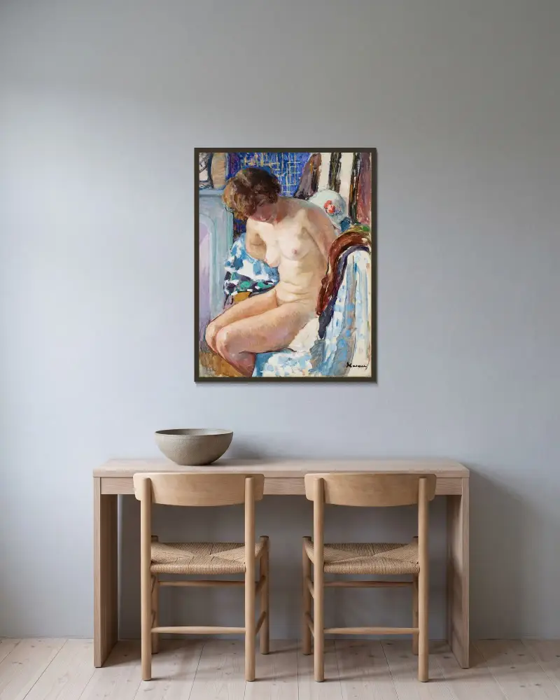 Naken sittande vid spisen av Henri Lebasque inramad på en vägg