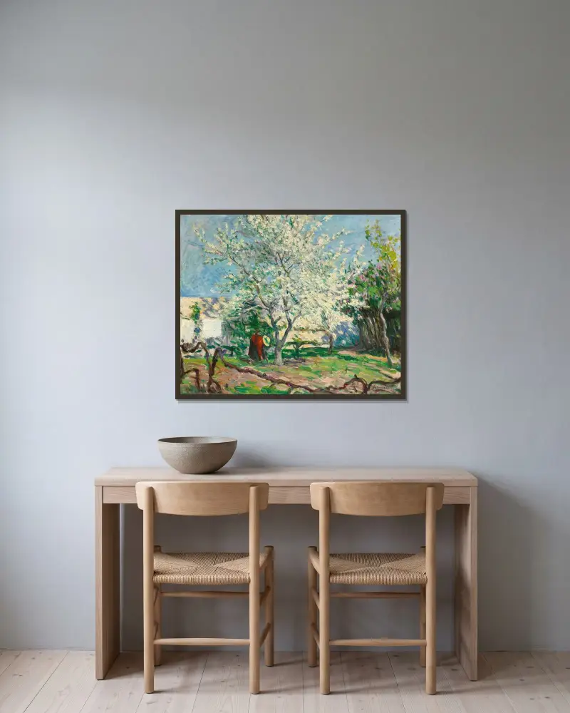 Blommande äppelträd av Henri Lebasque inramad på en vägg