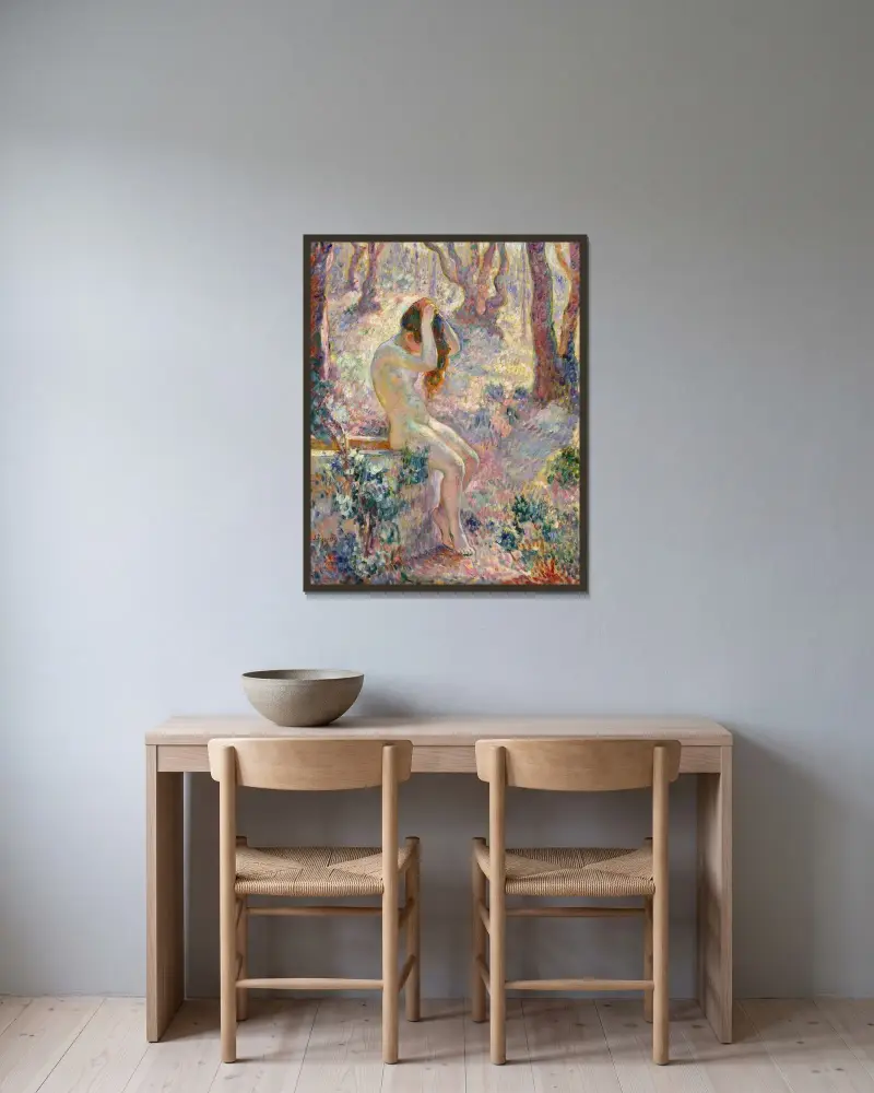 Ung naken kvinna sittande på kanten av en brunn av Henri Lebasque inramad på en vägg