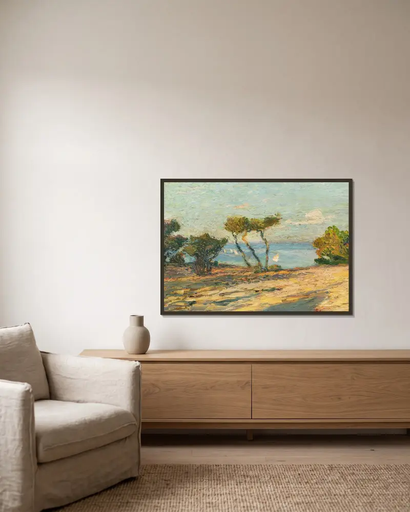 Havsstrand med tallar av Henri Martin inramad på en vägg