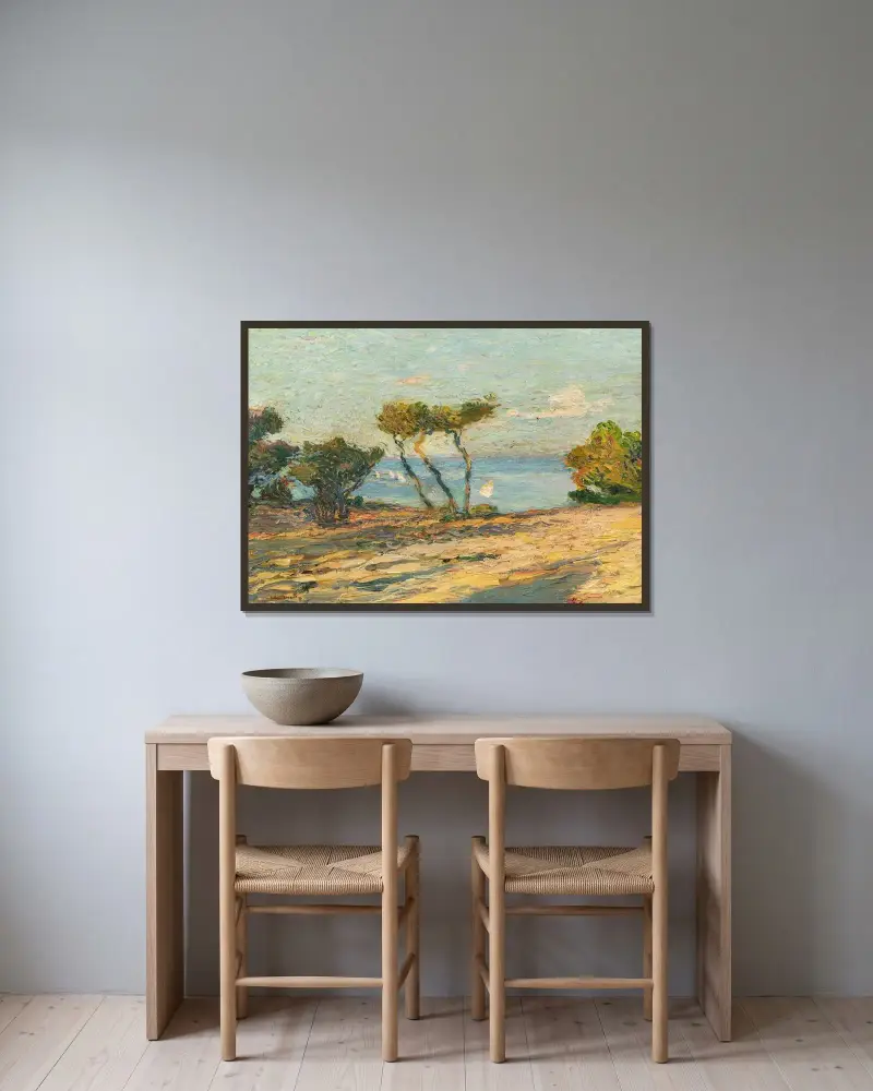 Havsstrand med tallar av Henri Martin inramad på en vägg
