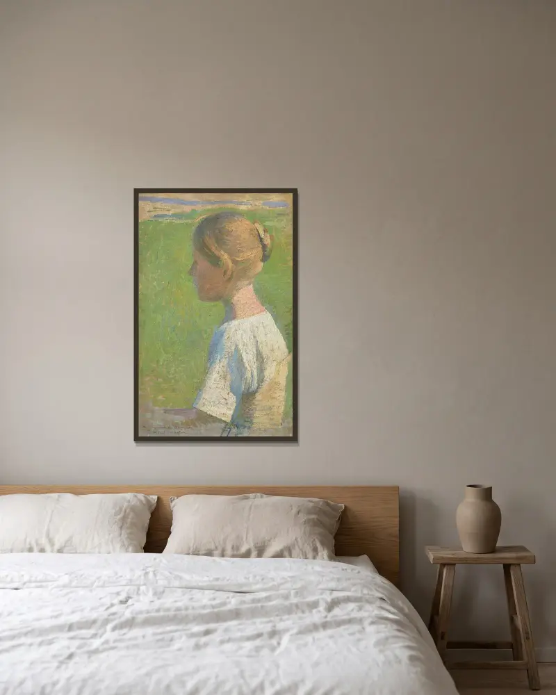 Ung kvinna i profil av Henri Martin inramad på en vägg