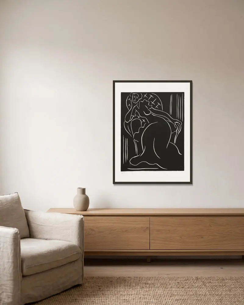 Femme au fauteuil av Henri Matisse inramad på en vägg