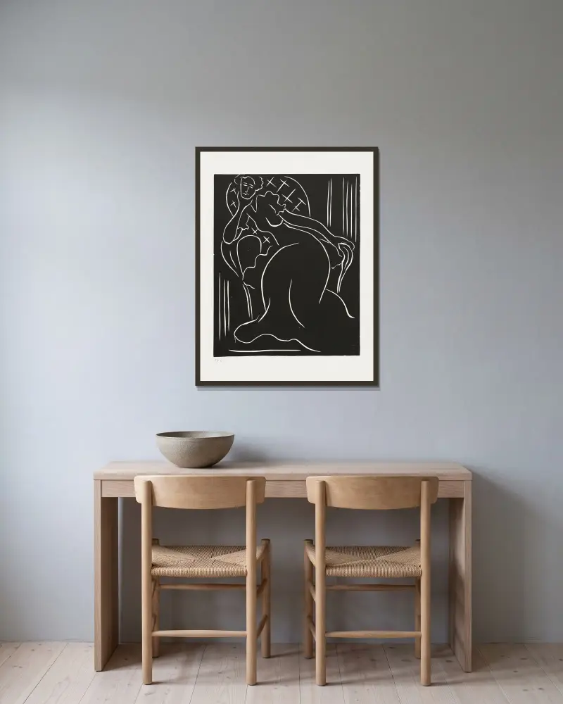 Femme au fauteuil av Henri Matisse inramad på en vägg