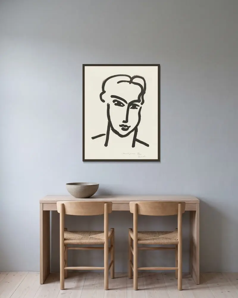 Grande tête de katia av Henri Matisse inramad på en vägg