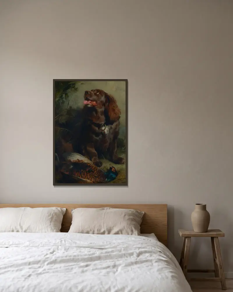 En Sussex spaniel och en fasan av Sir Edwin Henry Landseer inramad på en vägg
