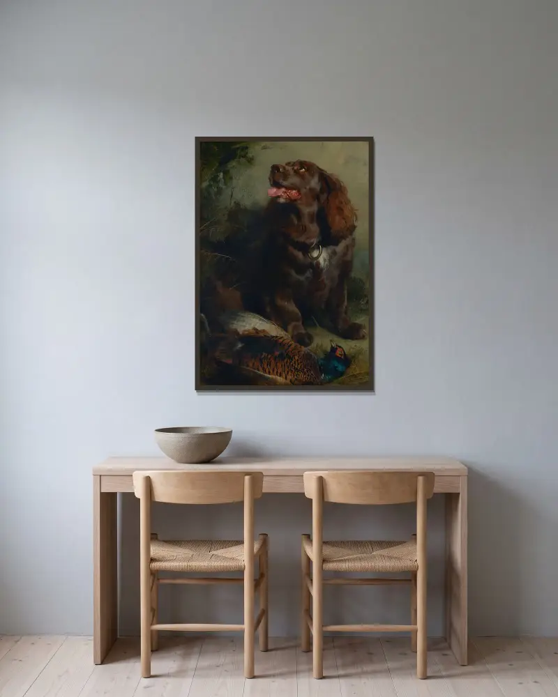 En Sussex spaniel och en fasan av Sir Edwin Henry Landseer inramad på en vägg