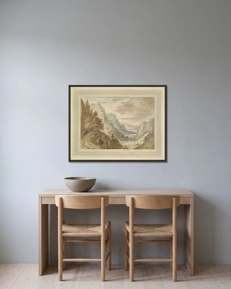 Bergslandskap av Herman Saftleven inramad på en vägg