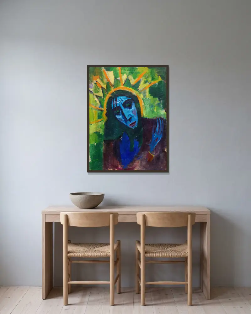 Christuskopf von Hermann Stenner gerahmt an einer Wand