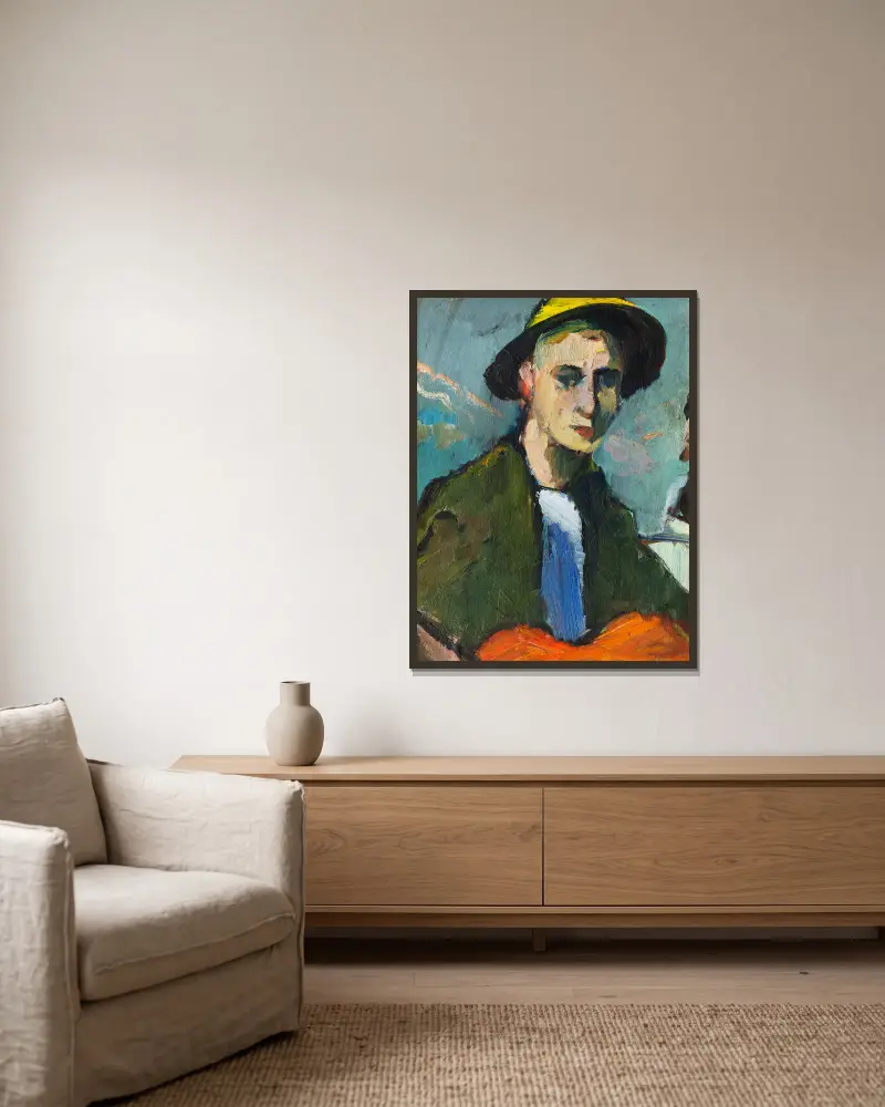 Selbstbildnis mit gelbem Hut von Hermann Stenner gerahmt an einer Wand