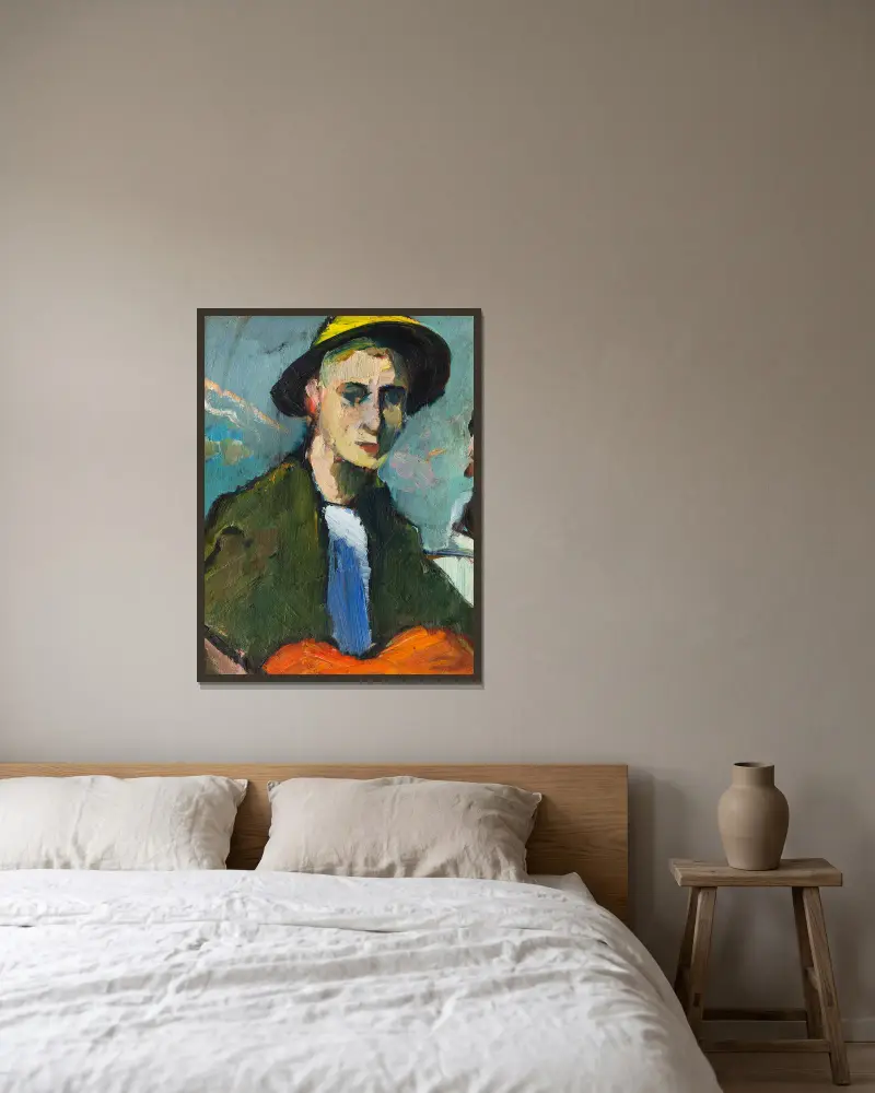 Selbstbildnis mit gelbem Hut von Hermann Stenner gerahmt an einer Wand