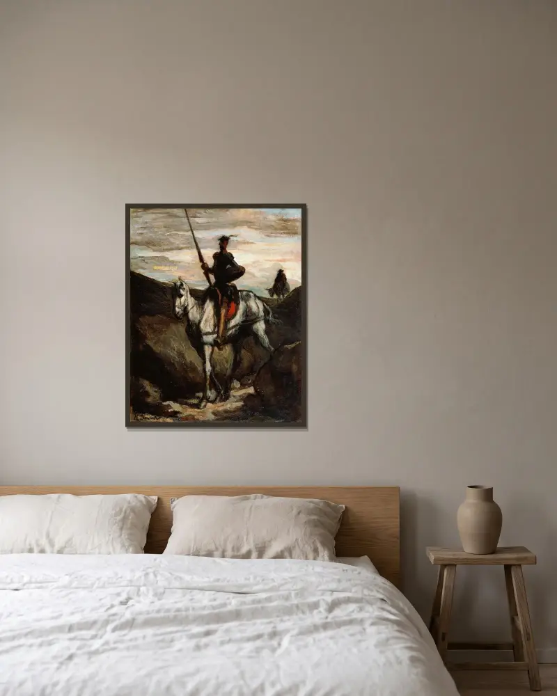 Don Quijote i bergen av Honoré Daumier inramad på en vägg