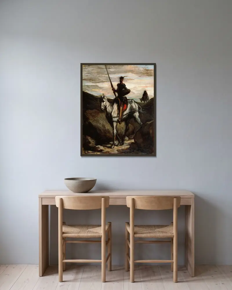 Don Quijote i bergen av Honoré Daumier inramad på en vägg