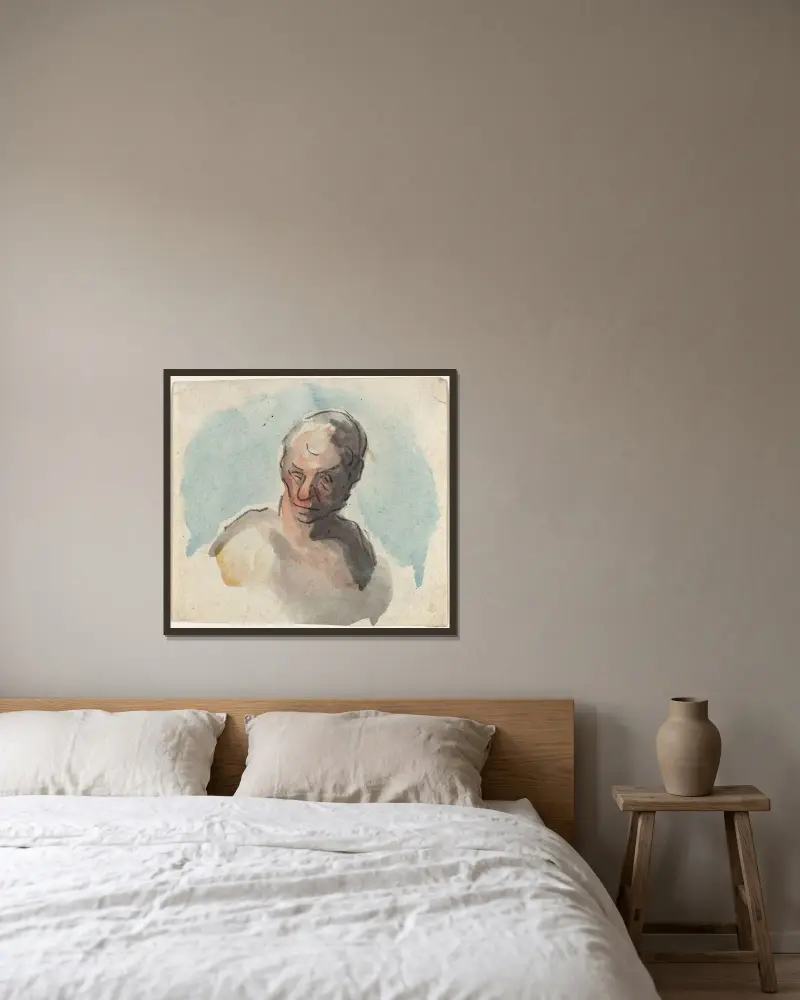 Manshuvud av Honoré Daumier inramad på en vägg